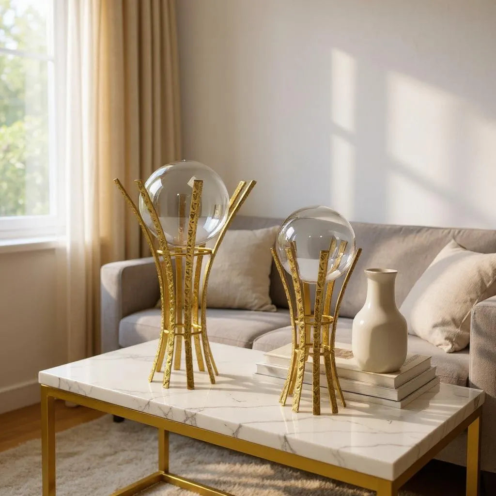 Escultura com Esfera de Vidro e Suporte em Ferro Dourado Alidolado